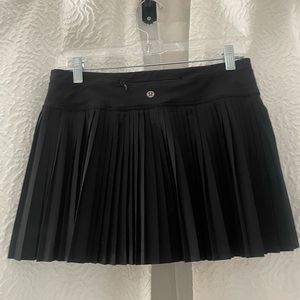 *DISCONTINUED* Black pleated Lululemon skirt.